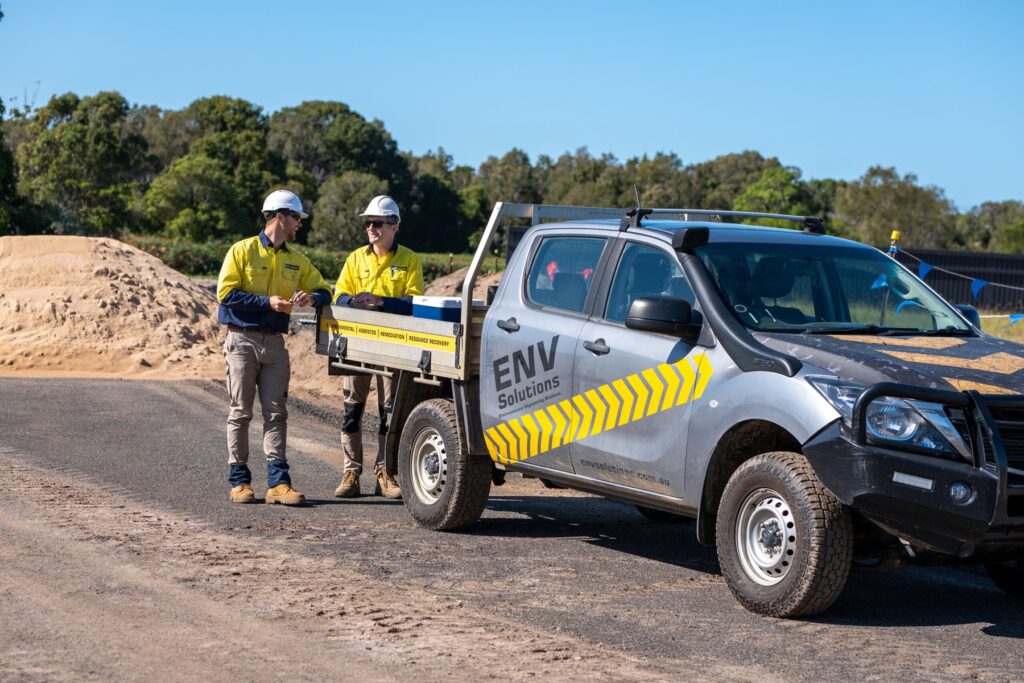 Environmental consultants conducting fieldwork in the outdoors, showcasing their expertise and hands-on approach.